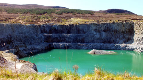 View down to a flooded quarry